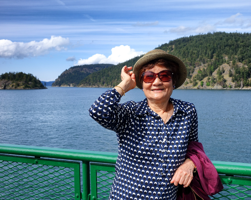 Senior woman outdoors near the water front