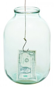 one dollar money and fishhook in glass jar isolated on white background