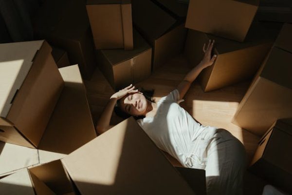 Picture of a woman surrounded by boxes